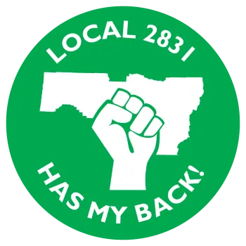A union fist raised with the outline of Lane County in the background. Words circled around that say "Local 2831 has my back!"